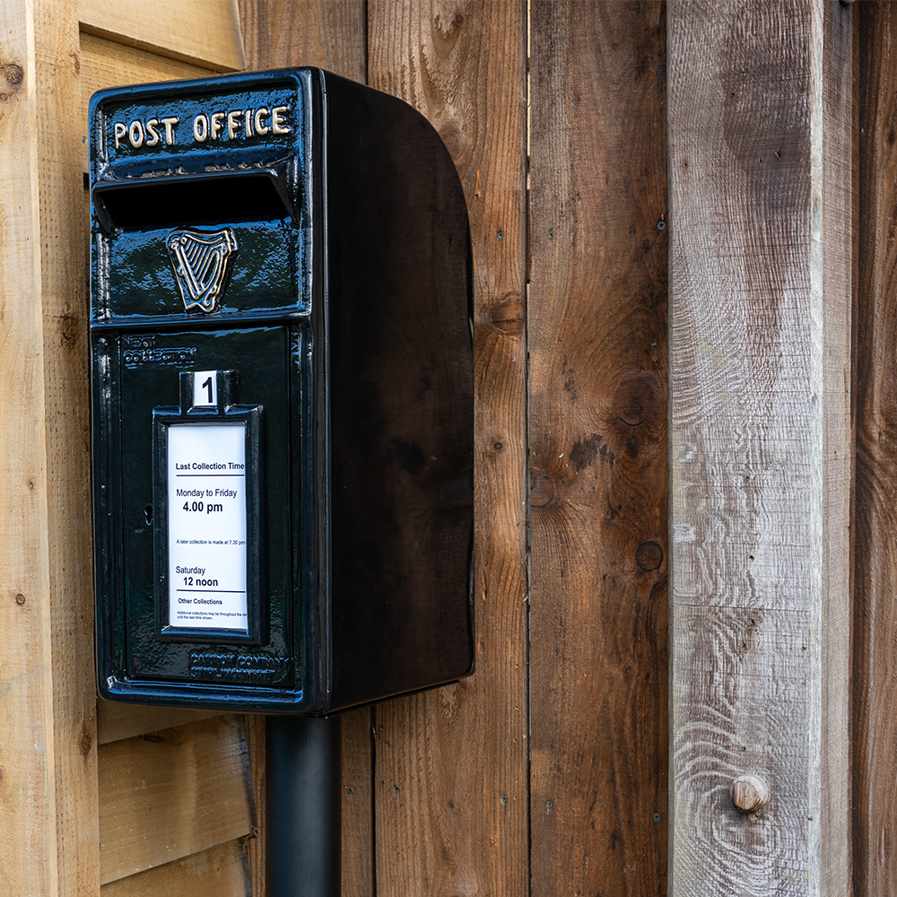 Black Irish Cast Iron Post Box.