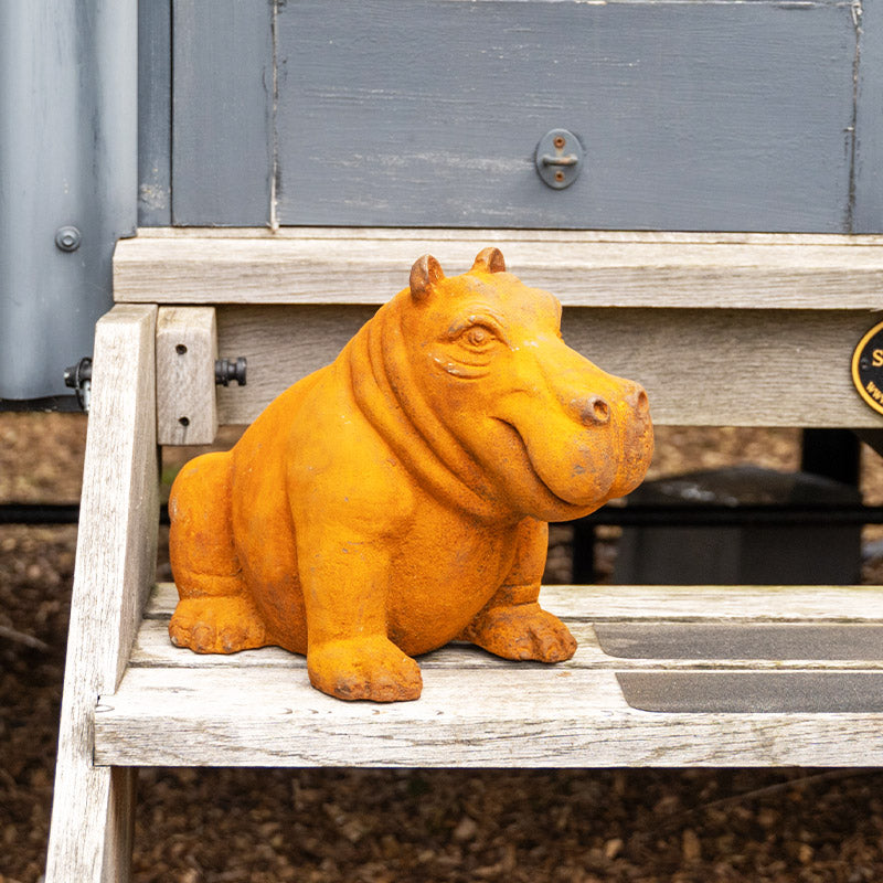 Cast Iron Outdoor Hippo Statues in Large and Small.
