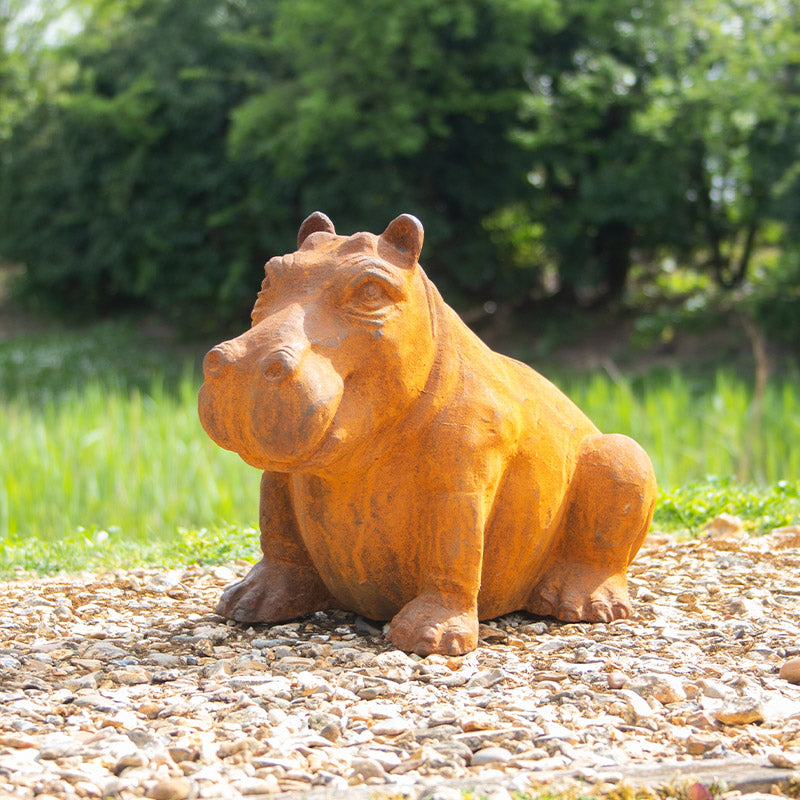 Cast Iron Outdoor Hippo Statues in Large and Small.