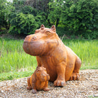 Cast Iron Outdoor Hippo Statues in Large and Small.