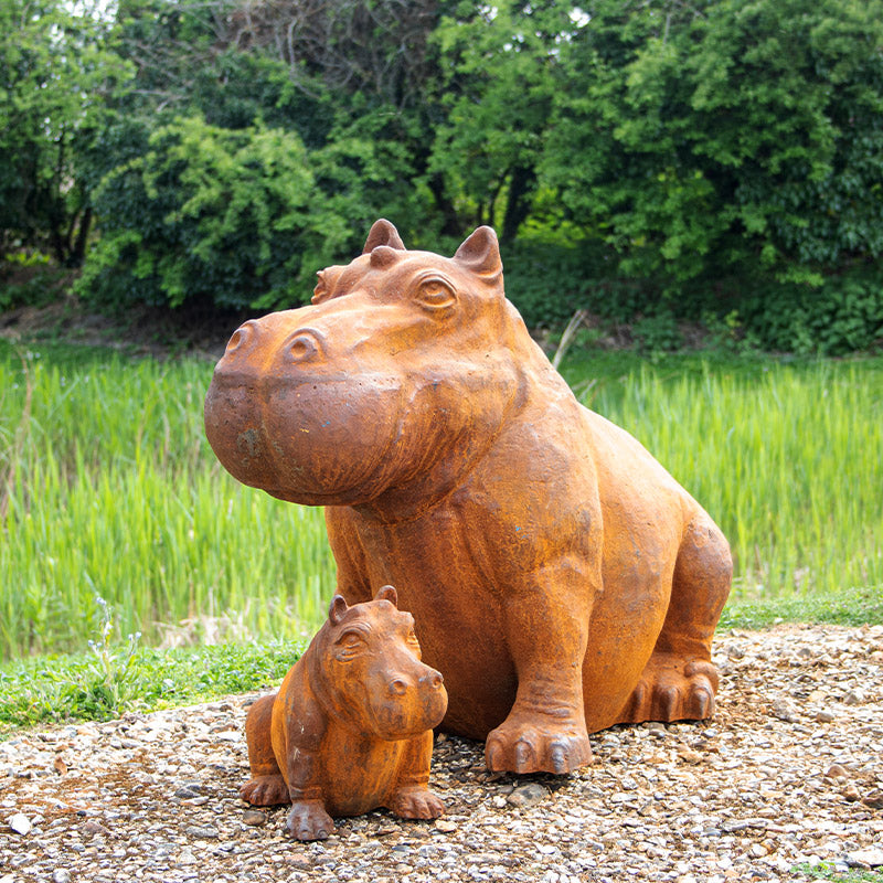 Cast Iron Outdoor Hippo Statues in Large and Small.