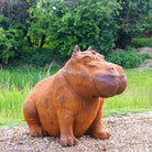 Cast Iron Outdoor Hippo Statues in Large and Small.