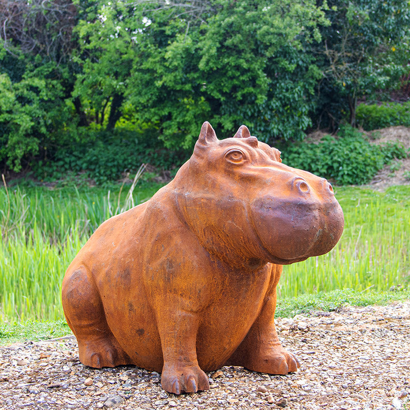 Cast Iron Outdoor Hippo Statues in Large and Small.