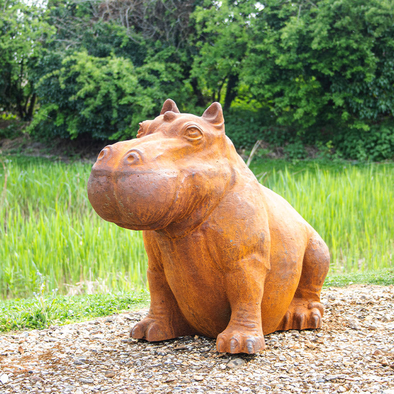 Cast Iron Outdoor Hippo Statues in Large and Small.