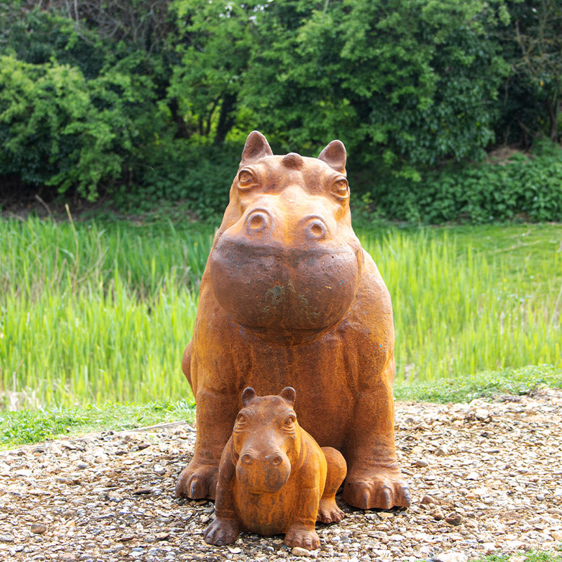 Cast Iron Outdoor Hippo Statues in Large and Small.