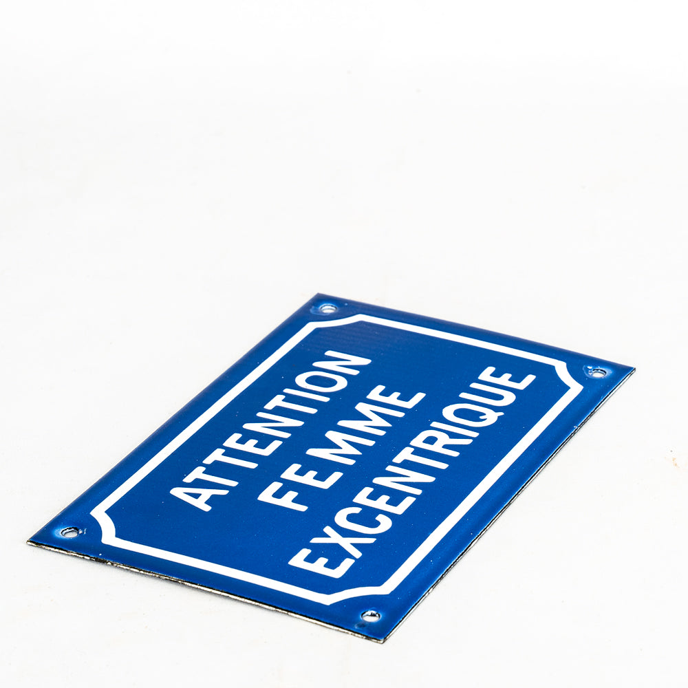 "Attention Femme Excentrique" Comical French Enamel Sign.