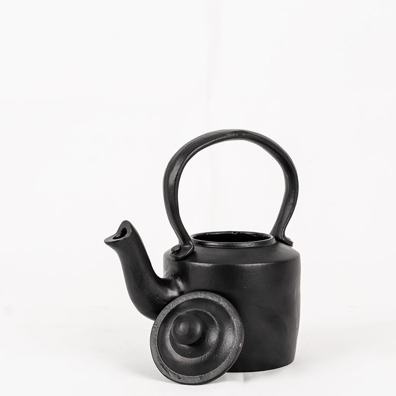 Small Black Cast Iron Kettle.