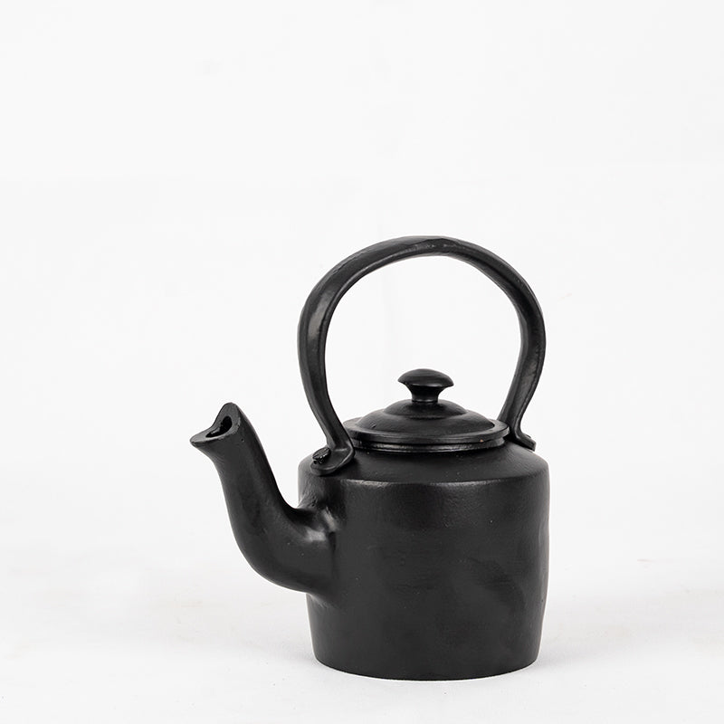 Small Black Cast Iron Kettle.
