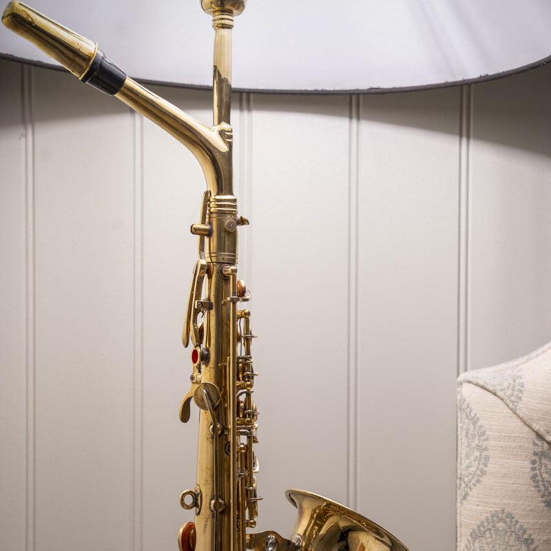 Large Saxophone Table Lamp with Black Shade.