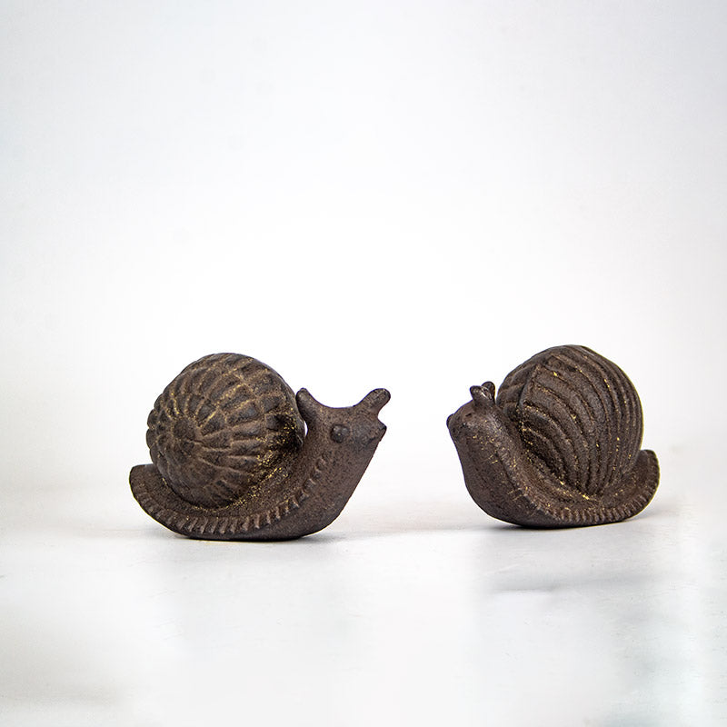 Pair of Snail Garden Ornaments.