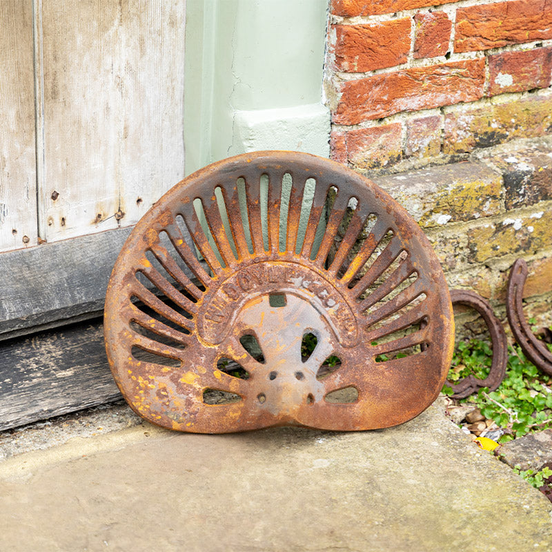 Cast Iron Outdoor Tractor Seat.