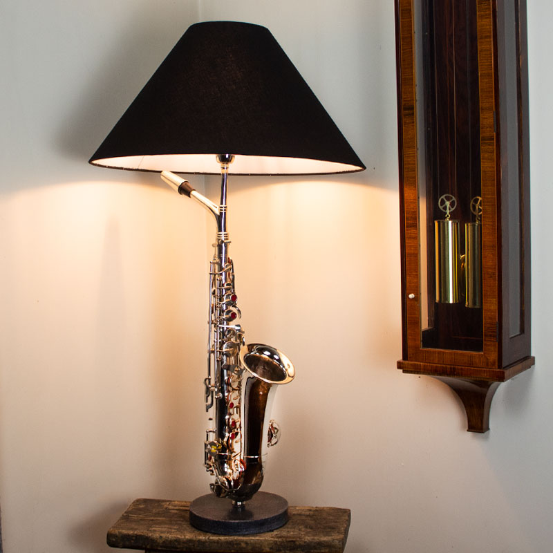 Large Saxophone Table Lamp with Black Shade.