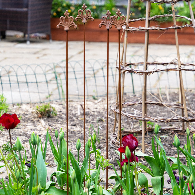 Set of Four Garden Plant Stakes.