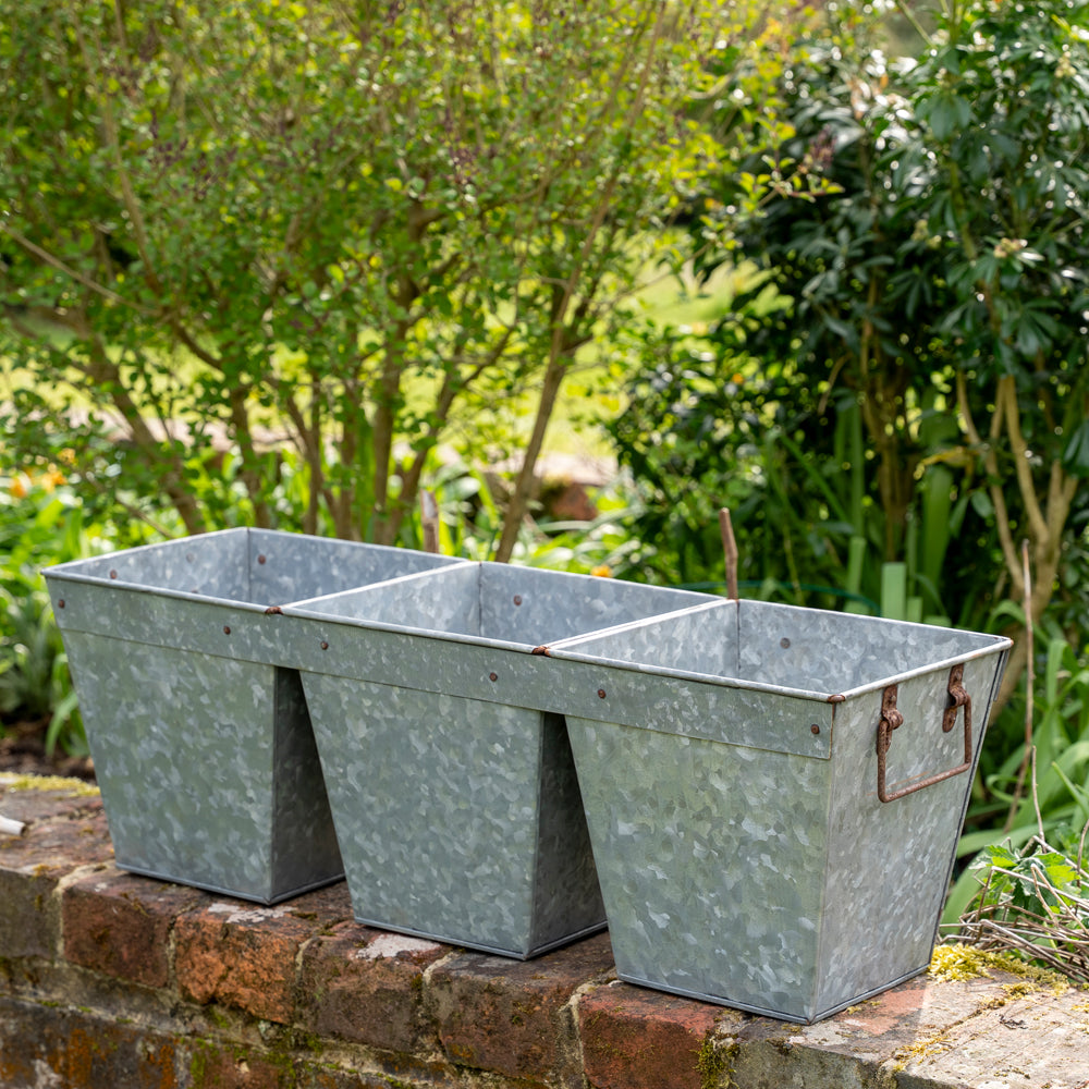 Three Galvanised Connected Planters.