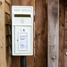 White CR 'Charles Rex' Cast Iron Post Box.