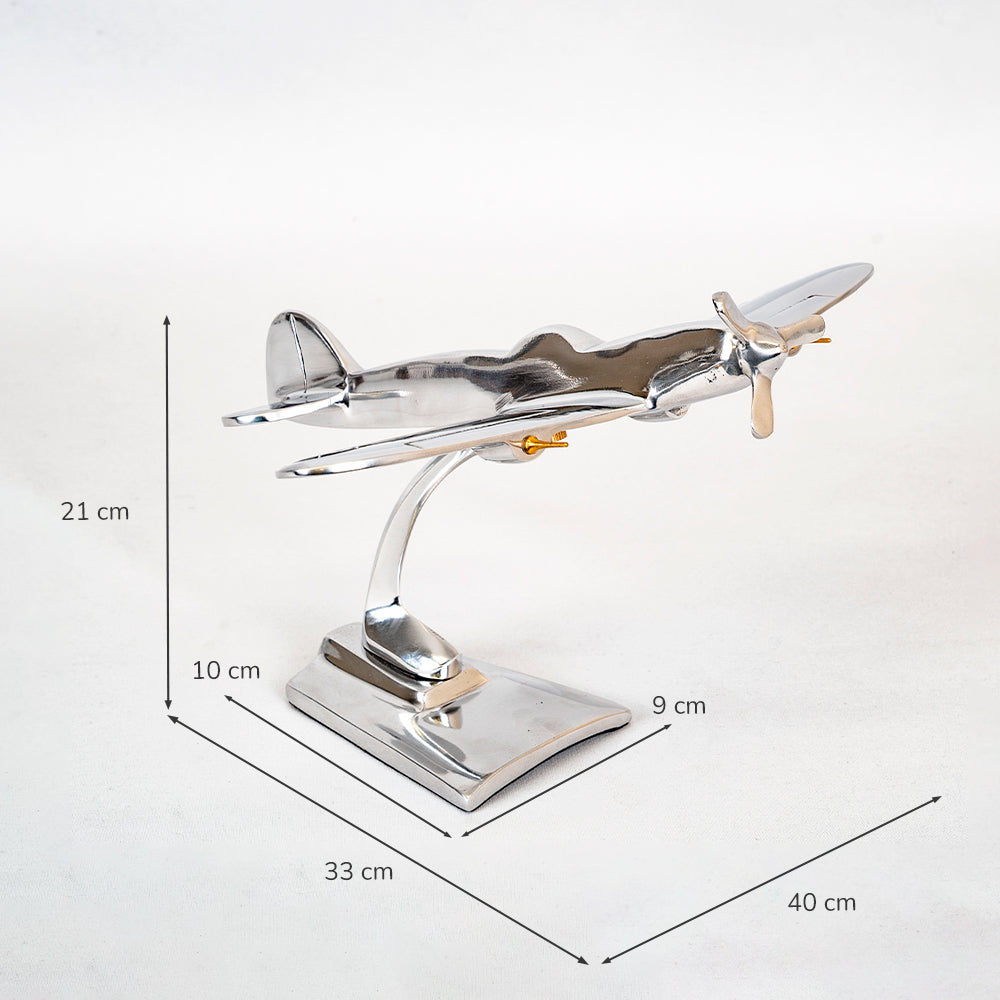 Metal airplane model with dimensions on a white background