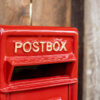 red wall mounted letter box
