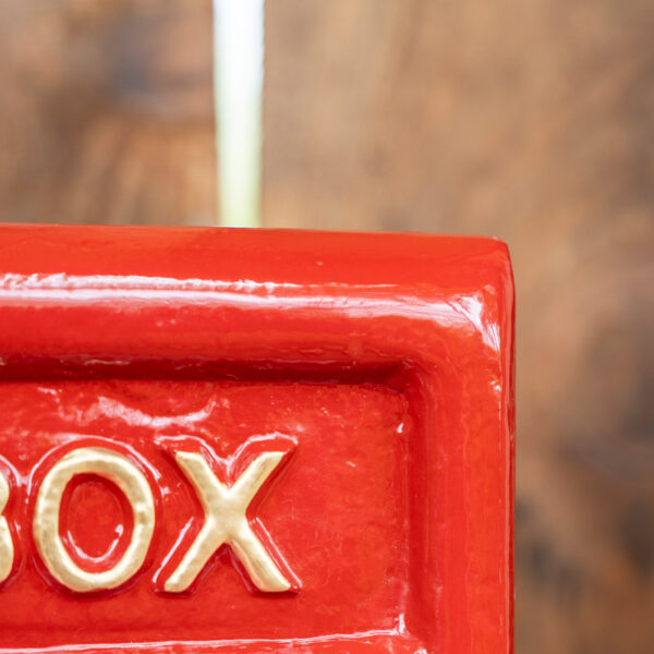 red wall mounted letter box